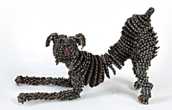 Artist creates metal dogs from recycled bike parts