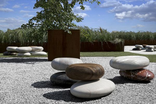 Outdoor seating by Kreoo mimics natural rock formations
